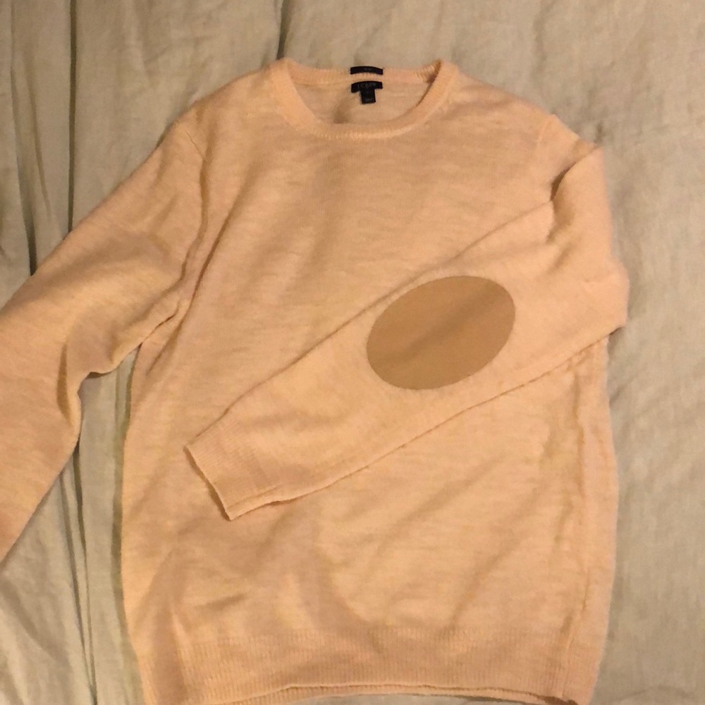 Stylish crew neck sweater with suede elbow patches